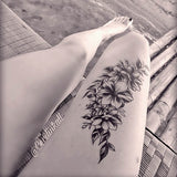 Tatouage éphémère fleurs noires tattoo ephemere fleur fleurs rose roses tatouage temporaire cuisse bras faux tatouage