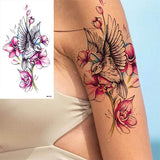 tatouage éphémère hirondelle du printemps fleurs rose fleur oiseau tatouages ephemere temporaire faux tatoo fake autocollant décalcomanie femme tattoo-ephemere 